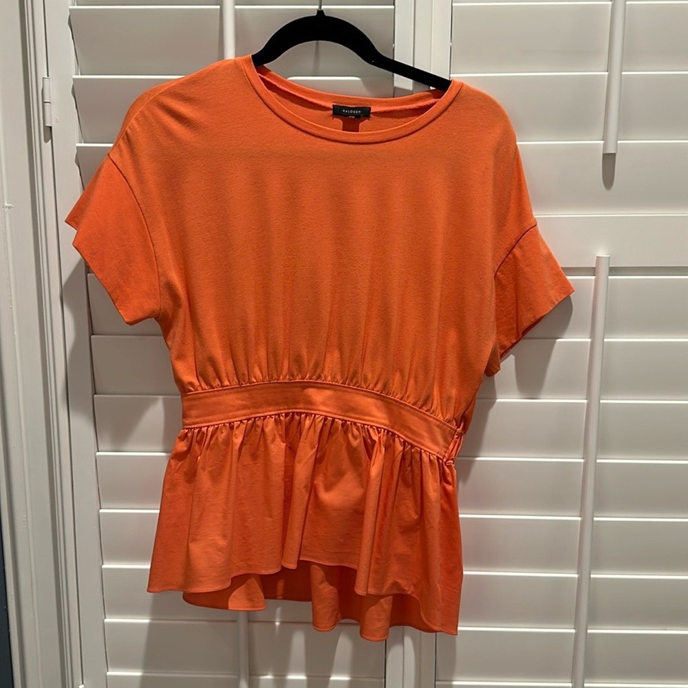 Orange peplum top